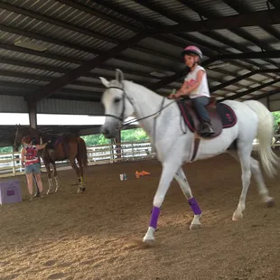 Aubrey Cate riding Sir Prize.
