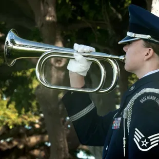 Taps being Played at PaPa Lou Foster's Funeral