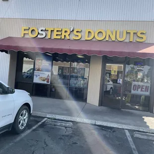 a car parked in front of the store