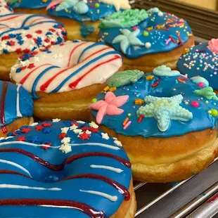 a variety of frosted donuts