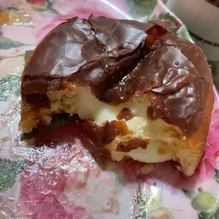 The inside of their cream filled chocolate donut