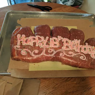 a birthday cake on a tray