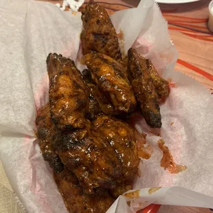 Wet hot wings with grill marks.  Actually the best Buff Wings I&apos;ve eaten in a long time.  Top five wing experiences here at Fosters.
