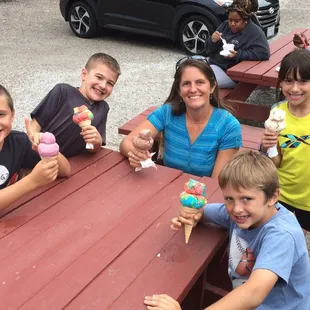 Cutest small ice cream cones and happy kiddos.