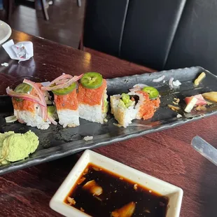 Spicy tuna on top spoiled. Tasted and smelled bad