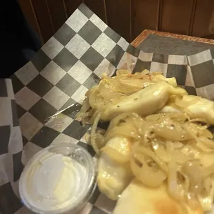 Pierogis!But I had to take the picture fast before my son made them disappear. We loved them so much we ordered another 6 to go.