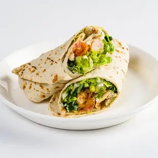 chicken kebab Caesar pita: chicken kebab, tomatoes, feta, pita croutons, baby kale, romaine with tahini ceasar