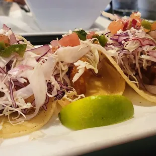 Fish tacos (ask for spicy ranch to drizzle over the slaw and they're perfect!)