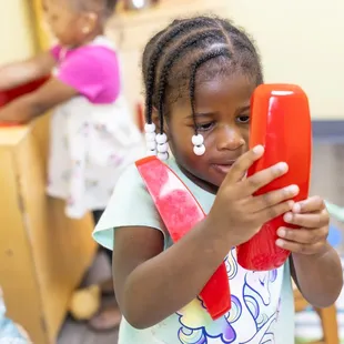 Our playtime activities promote vocabulary development and communication skills.