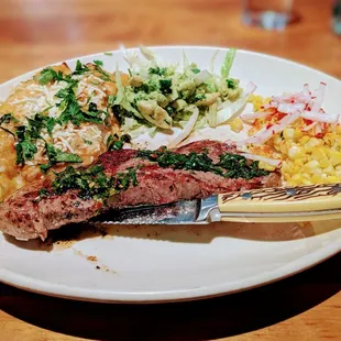 Steak and enchilada plate