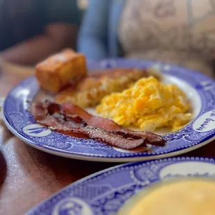 Eggs, bacon, hash browns and the French toast stick