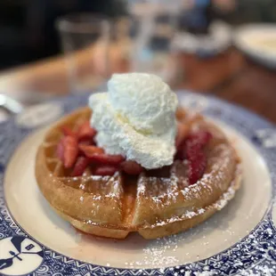 Waffle with strawberries and cream