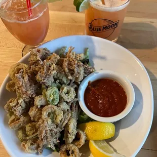 Calamari with Tommie Torres cocktail with Tito&apos;s.. it&apos;s so delicious..