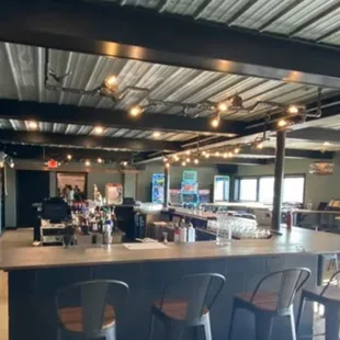 a view of the bar and dining area