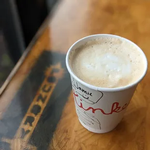 a cup of coffee on a table