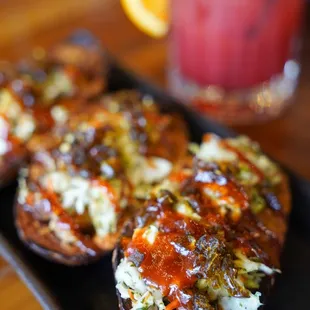 a plate of appetizers and a drink