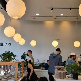 a group of people in a coffee shop