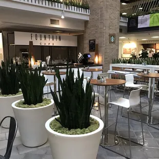 indoor dining area with tables and chairs