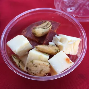 Spanish chorizo, white cheddar, pepper jack cheese, and nuts from Wildwood Market at the Yelp table!