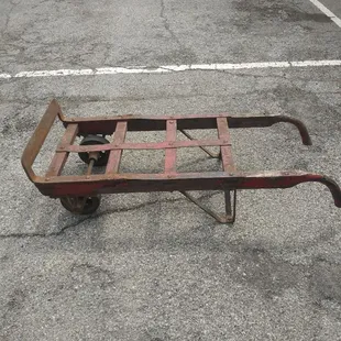 Vintage Hamilton 2 wheel industrial hand cart (refrigerator dolly). Marked at $110 obo. Use as industrial table, book case, garden art.