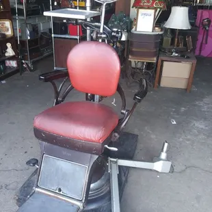 1920's dental chair. Base on wheels, Bausch &amp; Lomb. Used as a stage prop. $680 obo.