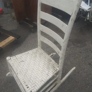 Vintage ladderback rocking chair. 16"deep 13" off the ground. Solid wood, very solid.