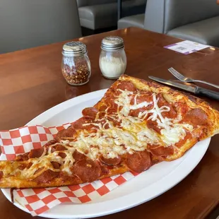 Giant slice of Pepperoni Pizza