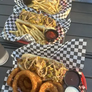 Griller dogs with onion rings and fries