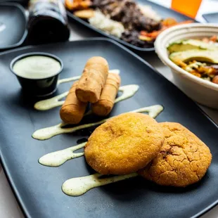 The Brothers party... stuffed chicken arepitas, and tequenos