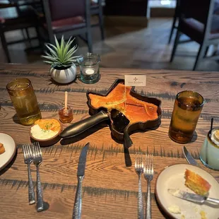 Corn bread with butter, honey and pimento cheese. Paired with four brother old fashioned and margaritas!