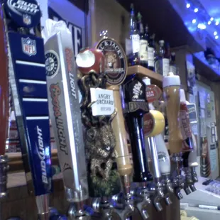 a row of beer taps