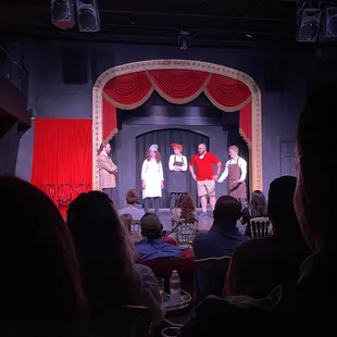 a group of people on stage