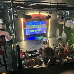 Great building, balcony for overflow, but sit so you can see both sides of the stage (piano player, and board)