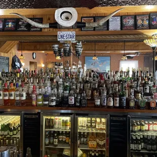 a bar full of liquor bottles
