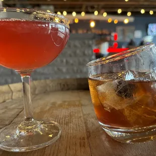 two cocktails on a table