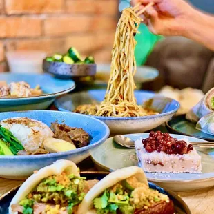 a table full of asian food