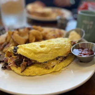 an omelet and potatoes