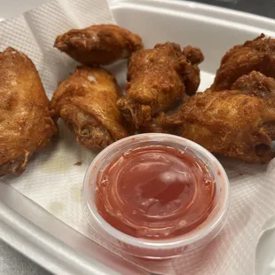 Lao 6 pcs CK wing with Sweet and sour sauce.
