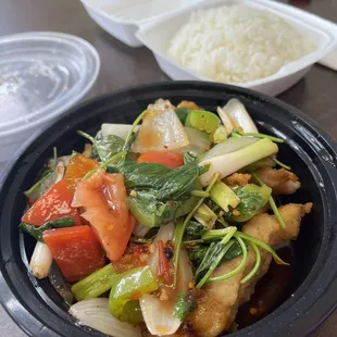 Fried fillet of fish with fresh veggies in garlic sauce.  (Pla Lard Prik)