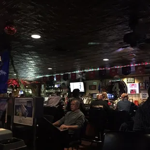 people sitting at the bar