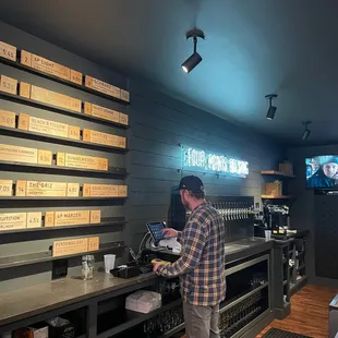 a man working at a bar