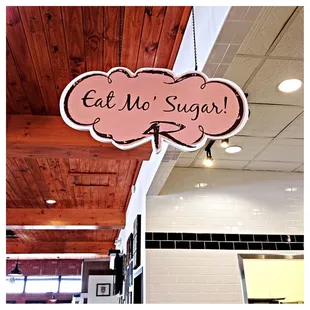 a sign saying eat no sugar