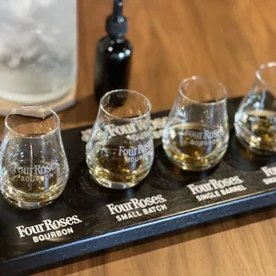 four glasses of bourbon