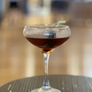 Manhattan at the four roses bar