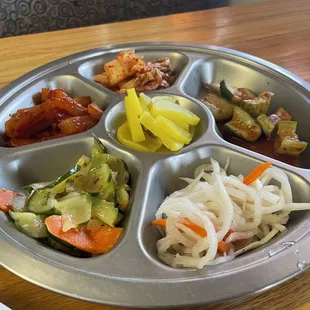 This is what the side dish look like. Her kimchi recipe is very hearty. She cooks like the korean grandma you didn't know you needed!