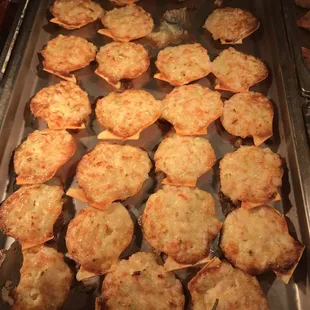 a tray of baked pizzas