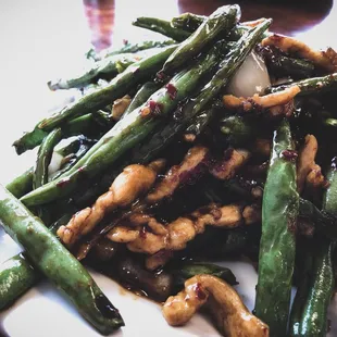 I eat here all the time. The Chicken with String Beans is my favorite.
