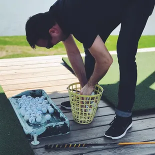 Large basket of 100 balls $10. Small $8.