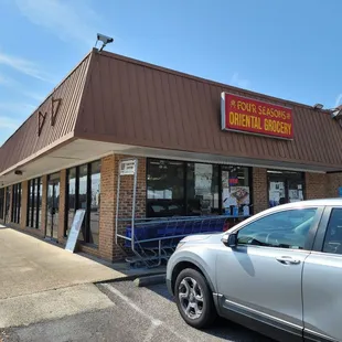a car parked in front of the store