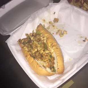 two hot dogs with toppings